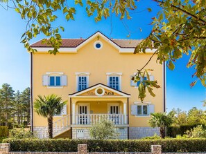 Plant, Sky, Building, Window, Property, Tree, House, Yellow, Cottage, Line