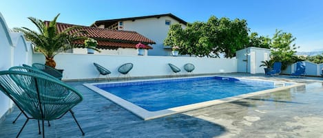 Sky, Water, Property, Plant, Swimming Pool, Building, Azure, Outdoor Furniture, Shade, House