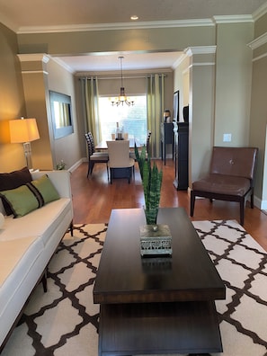 Formal living room leading to dining room