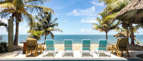 Sunbathing by pool - ocean side with outdoor shower