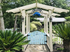 Welcome to "Bluegill Bungalow" private pergola entry with gates