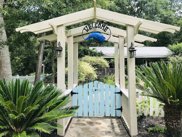 Welcome to "Bluegill Bungalow" private pergola entry with gates