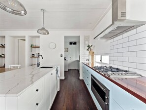 The stunning kitchen combines modern with country style.
