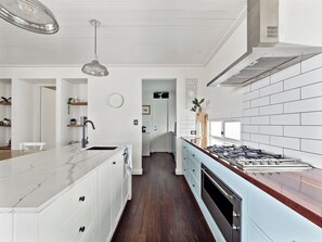 The stunning kitchen combines modern with country style.