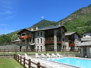 Sky, Building, Mountain, Property, Plant, Water, Cloud, House, Natural Landscape, Tree