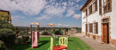 Sky, Property, Grass, Public Space, Real Estate, House, Lawn, Building, Cloud, Home