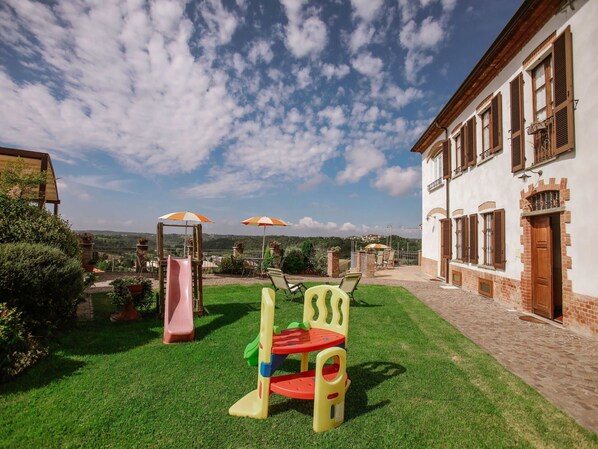 Sky, Property, Grass, Public Space, Real Estate, House, Lawn, Building, Cloud, Home