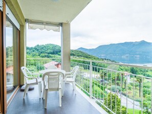 Sky, Furniture, Plant, Azure, Water, Chair, Table, Shade, Interior Design, Porch