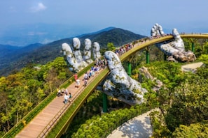 Golden Bridge on Bana Hills - 20km away by car then by cable cars up the mount