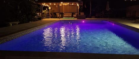 the pool has a color changing interior pool light. 