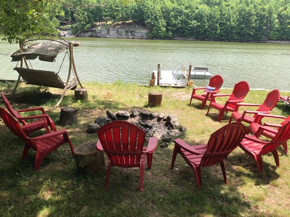 Roast hotdogs and s’mores while watching the boats 