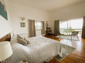 The master bedroom has its own balcony and en-suite shower with separate toilet