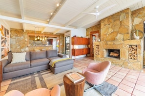 Living room with wood burning fireplace 