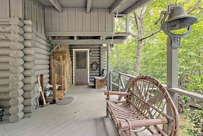 Mountaintop log cabin w/ wood stove hot tub and grill near Lake Chatuge