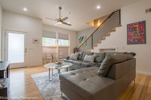 Modern & SPACIOUS open concept first floor living area! Relax in style in this light filled living space.
