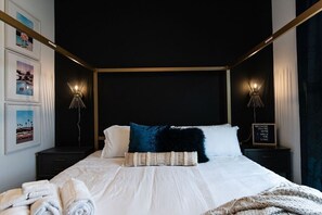 Wake up to a morning of sophistication in this luxurious bedroom.