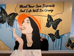 Capture the moment against our unique custom mural – it's an Instagram-worthy backdrop waiting for you!