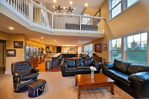 Sprawling living room into kitchen and dining