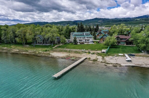 Spinnaker Point #1 & #2...  the lawn, lake, fire pit, and dock (drone shot)