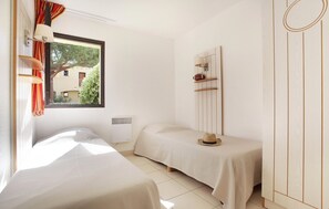The two bedrooms each contain 2 comfortable single beds each.