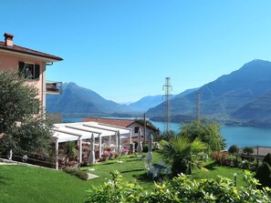 Sky, Plant, Mountain, Building, Property, Water, Nature, Window, Tree, Azure