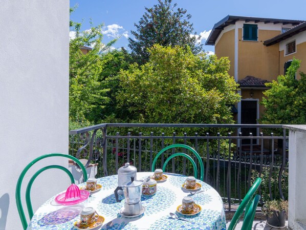 Tableware, Table, Food, Sky, Property, Plant, Building, Green, Window, Azure