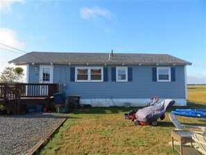 Side view of entrance to cottage with  off street parking included!