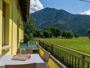 Sky, Cloud, Table, Property, Building, Plant, Mountain, Green, Window, Tree