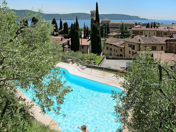 Water, Sky, Plant, Property, Building, Azure, Tree, Natural Landscape, Body Of Water, Swimming Pool