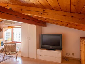 Property, Furniture, Cabinetry, Wood, Television, Interior Design, Floor, Comfort, Living Room