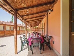 Table, Sky, Property, Furniture, Plant, Chair, Azure, Shade, Interior Design, Architecture