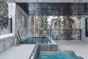 Soak your tired muscles in the outdoor hot tub & Endless Pool