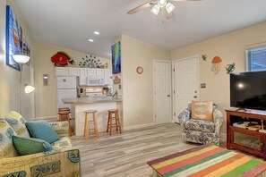 Kitchen - Open concept living room with a breakfast bar just steps away