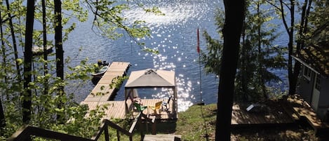 The lakeside dock as seen from the screened in porch looking East. 