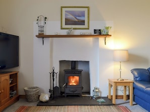 Cosy wood burner in the living room | Tote Cottage, Skeabost Bridge