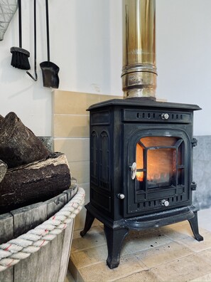 Wood burner in the bedroom.