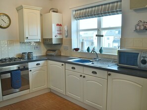 Well equipped kitchen area | Captain Ron’s, Beadnell, near Alnwick