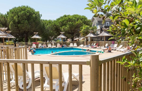 The residence has a large patio next to the beautiful pool great for enjoying the summer weather