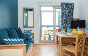 Sink into the cozy sofa after a day exploring the area.