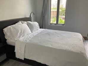 Master bedroom with downtown and river views.