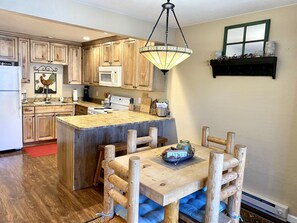 Fully equipped kitchen and dining area