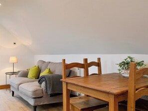Open plan living space with wooden floor | Apple Barn, Applethwaite, near Keswick