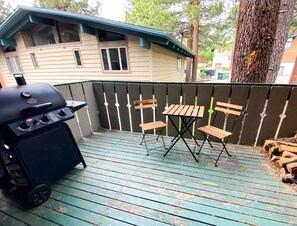 Balcony with BBQ and firewood for the indoor wood stove :)