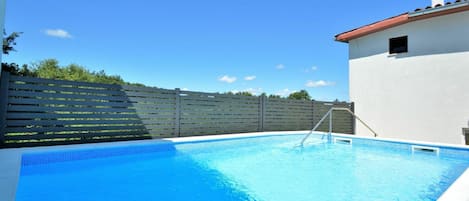 Water, Sky, Cloud, Building, Swimming Pool, Blue, Azure, Plant, Shade, Rectangle