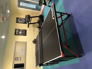 Play room area includes ping pong table and foosball! KIDS ALERT!