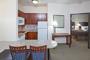 Drift to sleep in a comfortable Queen bed at the end of a long day.
