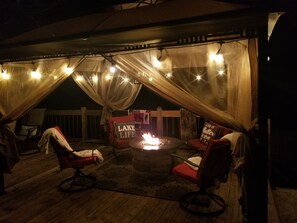 Covered fire table area. Perfect for relaxing and sharing memories...