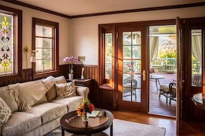 Living Room opens to the large deck and outdoor dining area