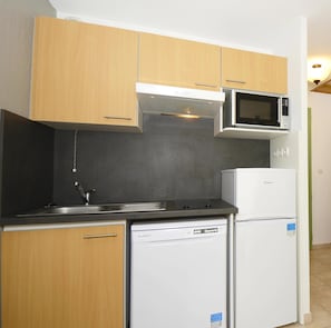 Curb your appetite by indulging on a snack in your kitchenette!