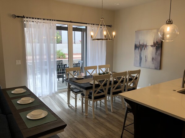 Welcome to our home!  Spacious and plenty of seating with a view of the pool!